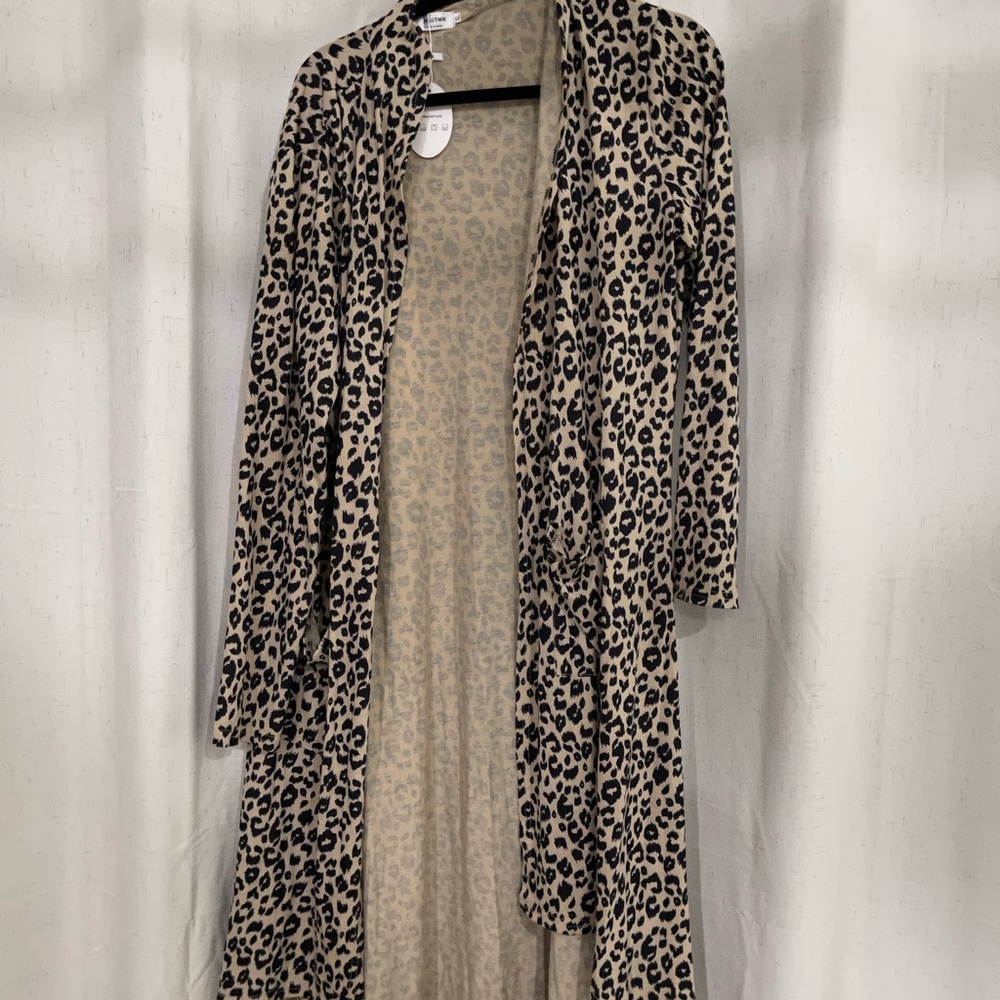 Never been worn cheetah cardigan